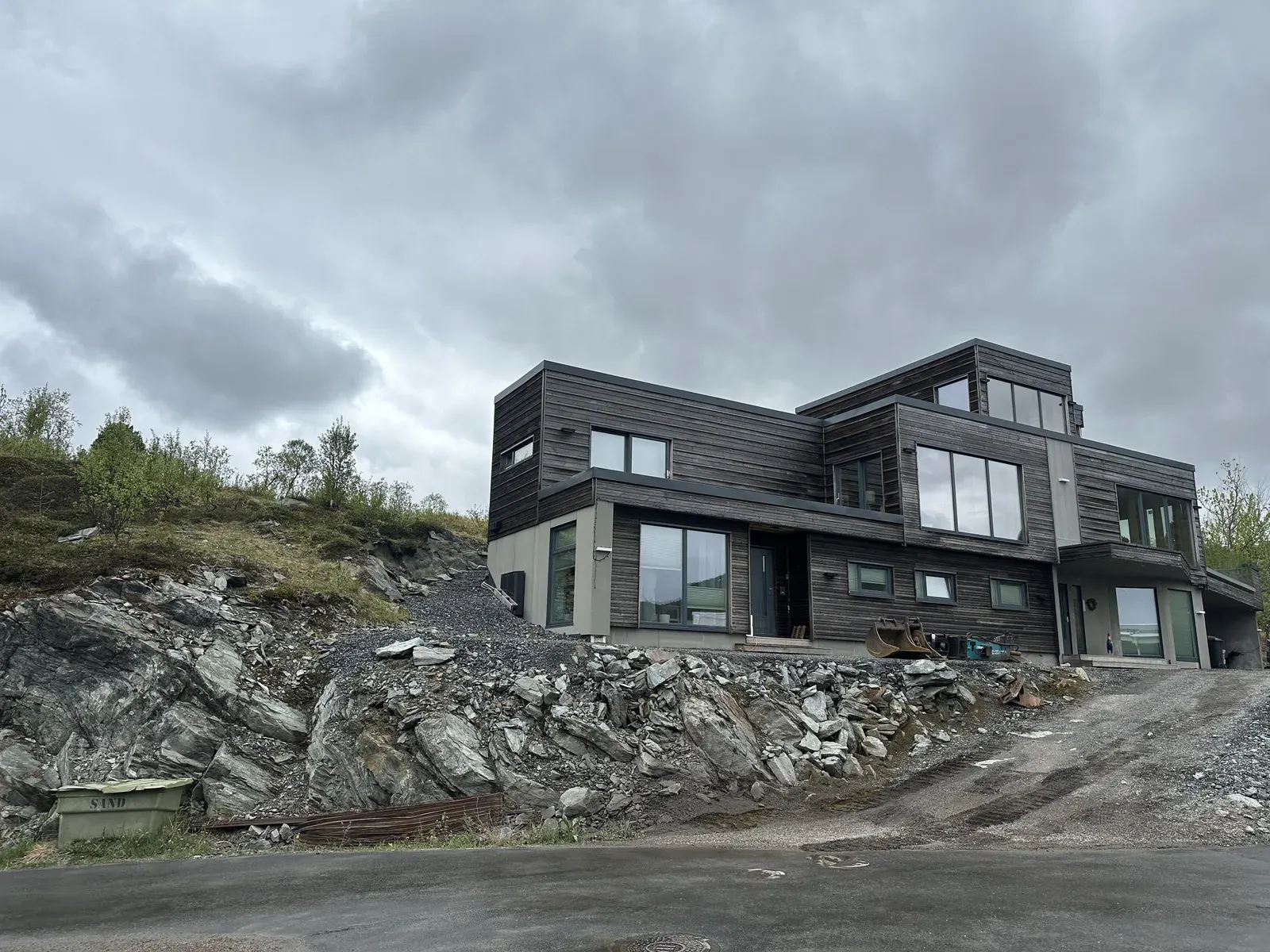 Gravemaskin i grunnarbeid